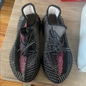 Yeezy Black and Red Knit Sneakers